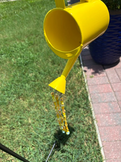 Yellow Watering Can Garden Display