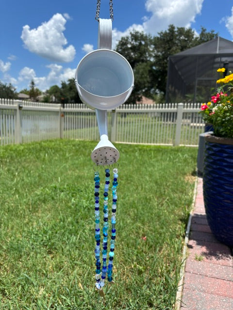 Blue Watering Can Garden Display